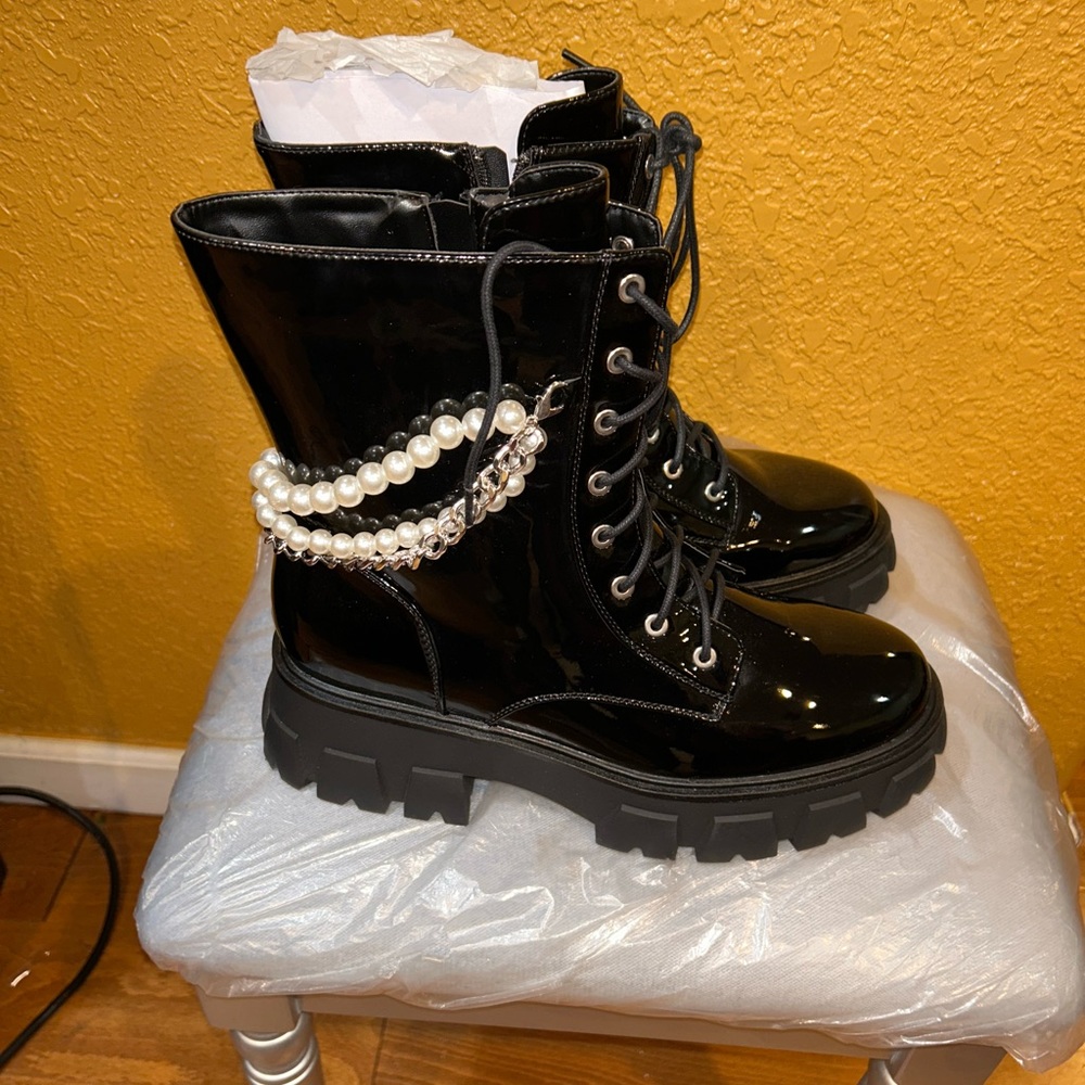 One of a kind boots with a pearl chain.
